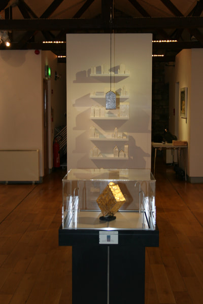 Gold Standard. by contemporary artist Niamh O'Connor.  installation view Market House Gallery, Monaghan  Hidden out loud installation behind